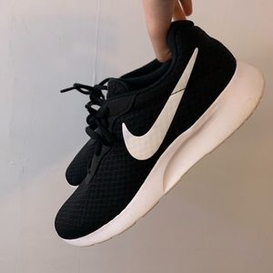 Women’s Black Nike Tennis Shoes with White Swoosh